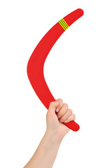 Hand with boomerang - obrazy, fototapety, plakaty