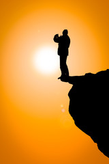 Naklejka premium Man on the cliff