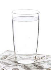 Dollars and glass of water