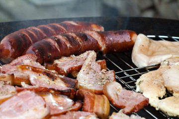 barbecue with delicious grilled meat on grill