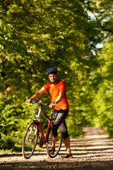 Biker on the forest road