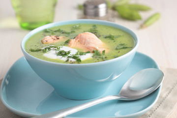 Cream of green pea soup with salmon