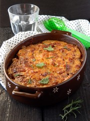 Casserole of lentils with aromatic herbs and cheese