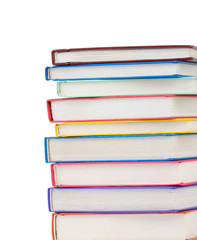 pile of new books isolated on white