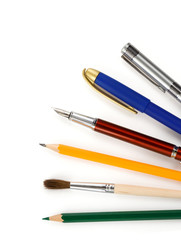 pens and pencils isolated on white
