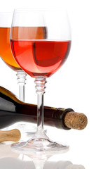 wine in glasses and bottle isolated on white