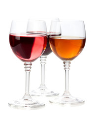 wine in glasses isolated on white