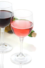wine in glasses and bottle isolated on white