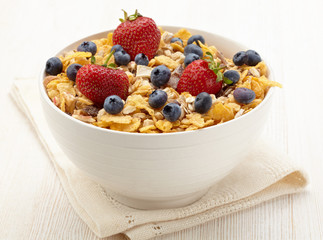 Bowl of healthy muesli and fresh berries