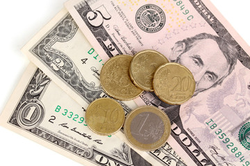 Dollar bills and coins close-up