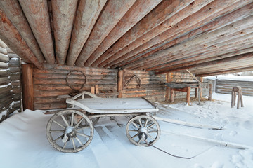 Fototapeta na wymiar Wooden cart under the wooden awning