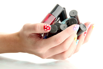woman hands with nail polishes isolated on white