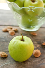Green apples on table