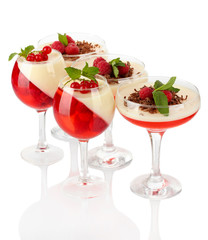 fruit jelly with chocolate and pberries in glasses isolated