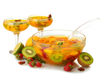 punch in bowl and glasses with fruits, isolated on white