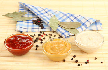 various sauces on bamboo mat