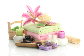 beautiful spa setting with lily isolated on white