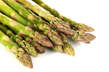 Fresh asparagus isolated on white.