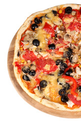 Tasty pizza with vegetables, chicken and olives close-up