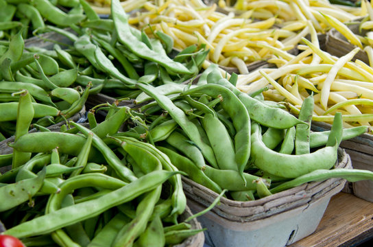 Multiple Green Pea Pods and Yellow Wax Beans in Baskets