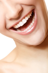 Obraz na płótnie Canvas Perfect smile of beautiful woman with great healthy white teeth.