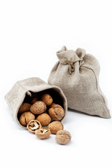 Walnut in a bag on a white background