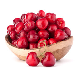 cherry berries in wooden bowl