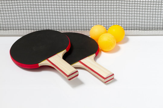 Table tennis rackets and balls