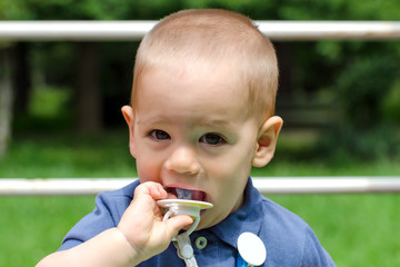 Kid with pacifier