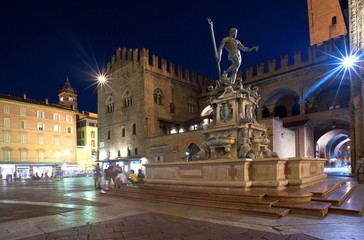 Fountain of Neptune at night time in Bologna. Italy.
