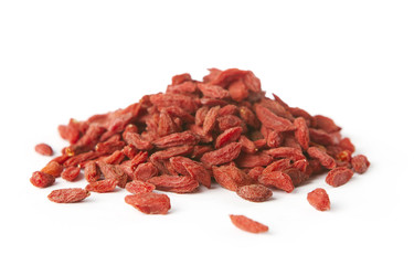Pile of dry goji berries isolated on white background