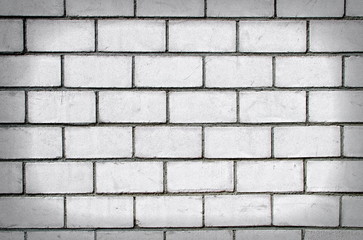 Backsteinmauer hellgrau, HDR, spotlight