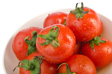 Fresh tomatoes isolated on the white