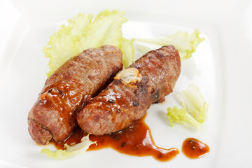 grilled sausages with sauce