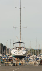 Sailboat in dry dock on jack stands