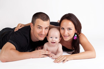 Fototapeta premium Happy family - mother, father and baby