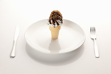 Ice cream cone on a place setting