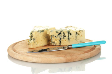 Cheese with mold and knife