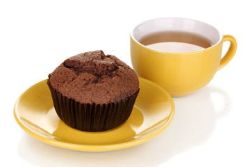 Fresh muffin with tea isolated on white
