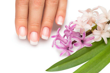 Professional manicure with spring flowers