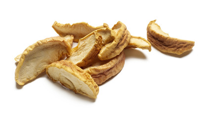 Dried apple segments on white background