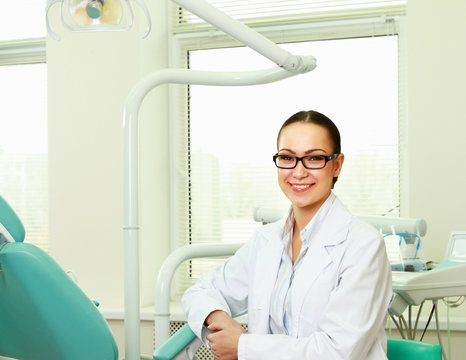 Dentist doctor smiling in camera