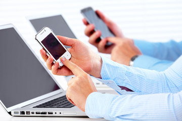 Business people calling by smartphone.