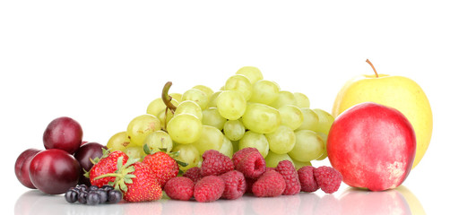 Mix of ripe sweet fruits and berries isolated on white