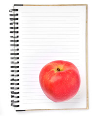 Notebook and apple isolated