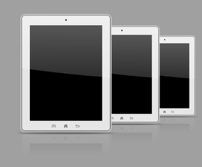 Three white tablet pc