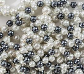String of black and white pearls