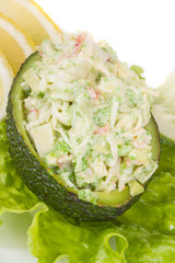 Crab meat salad with green caviar in avocado - japan cusine