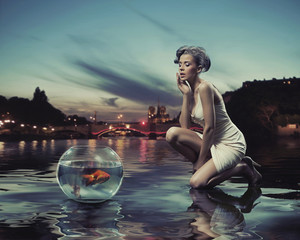 Beauty lady with gold fish