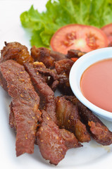 Marinated pork fried garlic, Eaten with ketchup